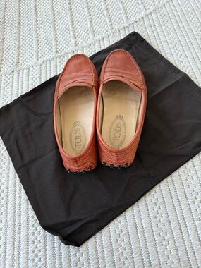Tod's Orange Leather Loafers comes with designer shoe bag size 7